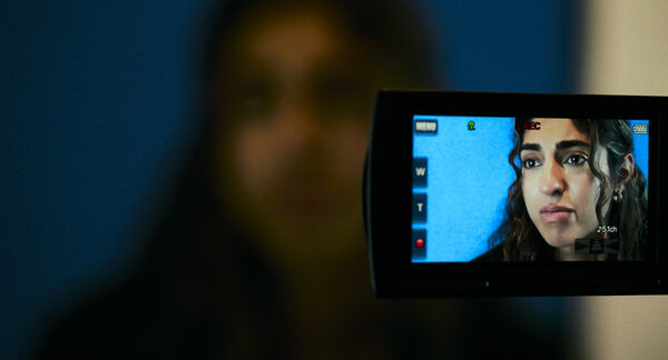 A camcorder monitor showing the Actor recording an audition for herself.